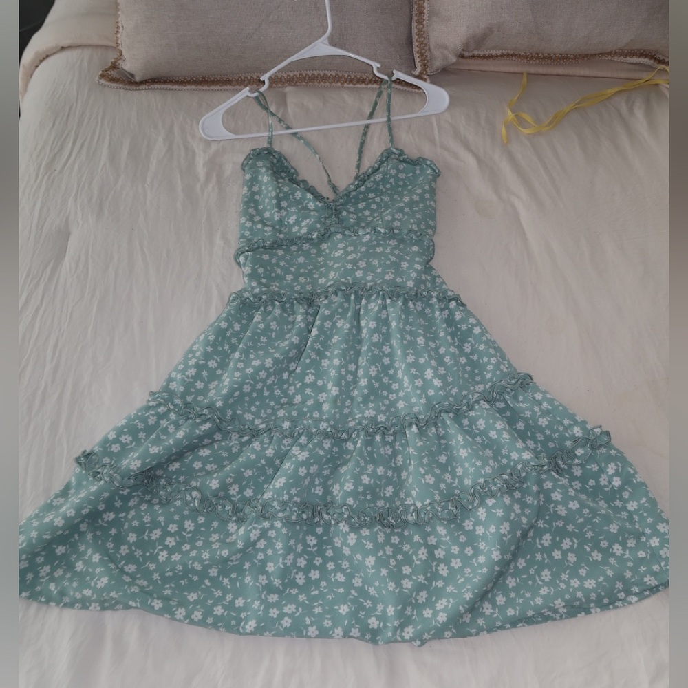 Pastel green and floral mini dress with ruffle detail. Size S